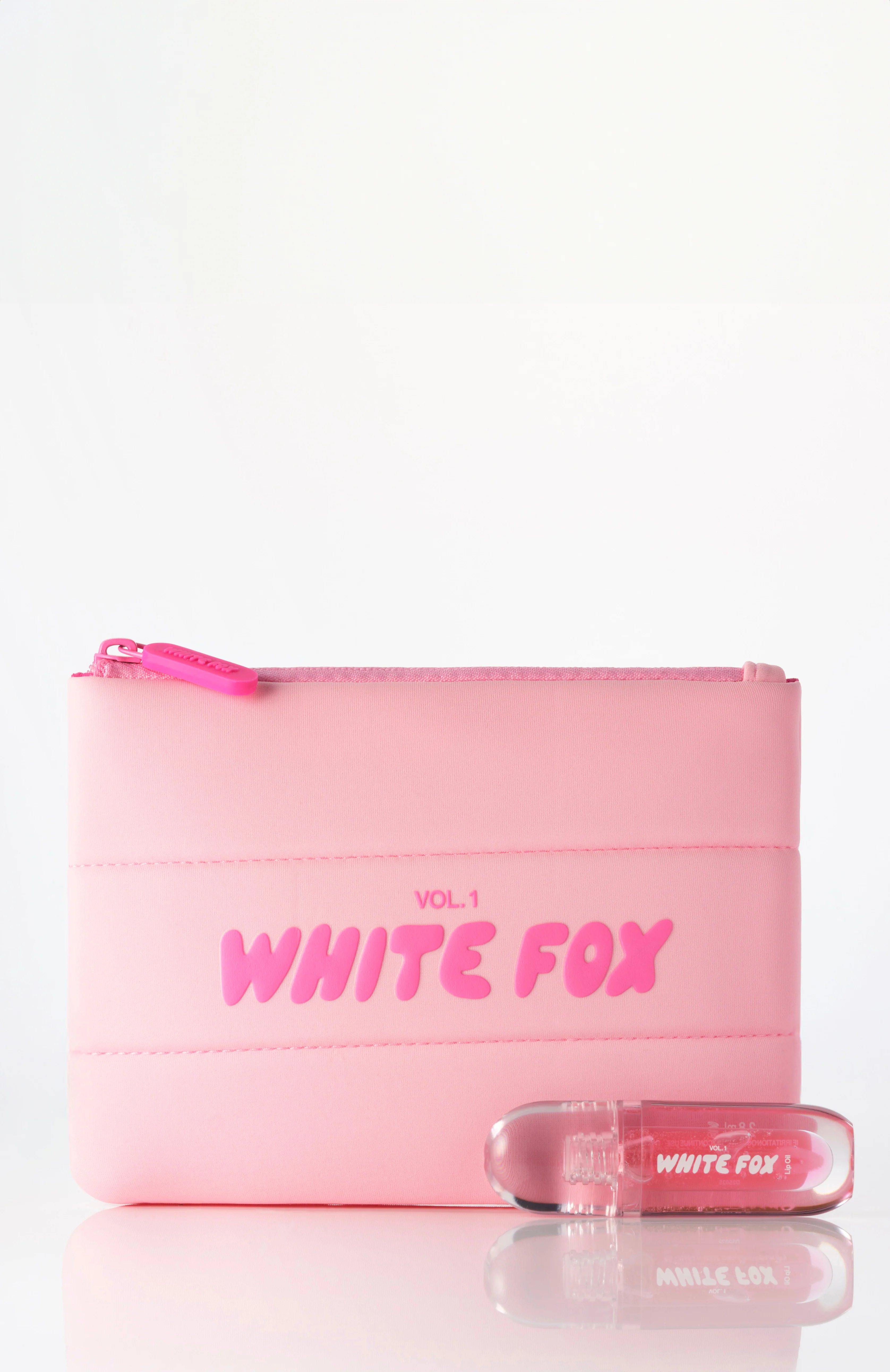 11061-the-cosmetic-pouch-lip-oil-1.webp The Cosmetic Pouch & Lip Oil