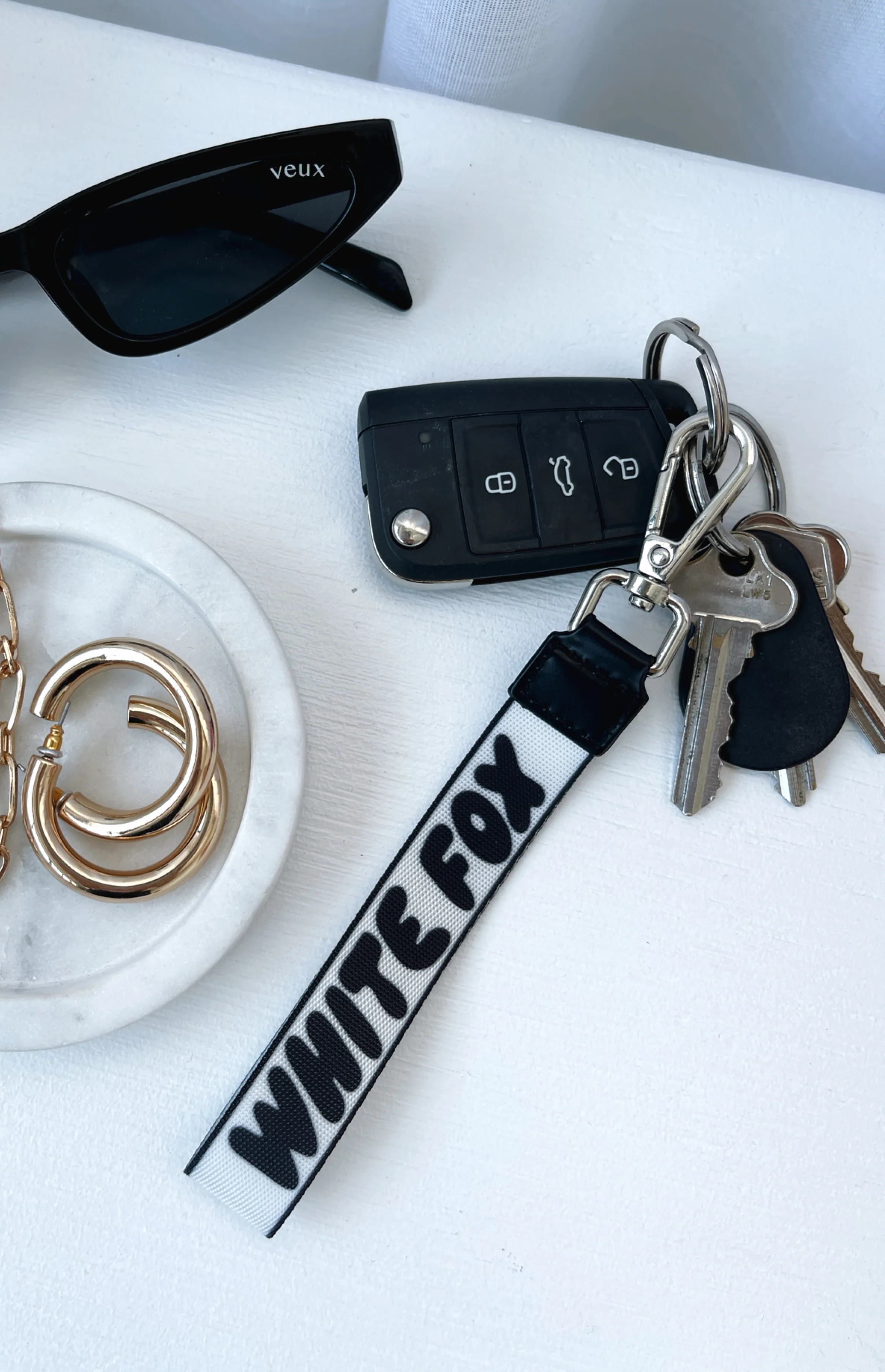 8665-next-level-strap-keychain-black-1.webp Next Level Strap Keychain Black